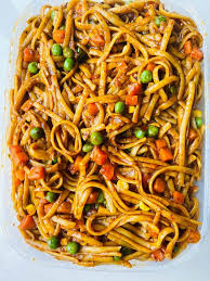 PASTA JOLLOF WITH CHICKEN GIZZARD