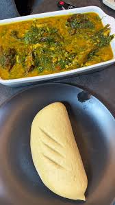 POUNDO/SEMO/EBA WITH EDIKANKONG, CHICKEN/GIZZARD