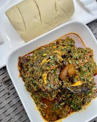 POUNDO/SEMO/EBA WITH AFANG, TURKEY/GOAT MEAT